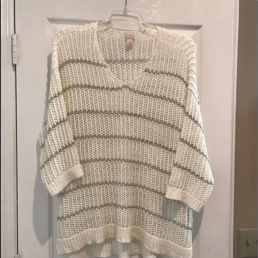 White Chico’s sweater with silver threading